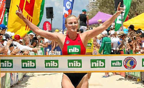 Alicia Marriott acknowledges the crowd’s applause as she takes out the Coolangatta Gold in 2009. Alicia Marriott acknowledges the crowd’s applause as she takes out the Coolangatta Gold in 2009.